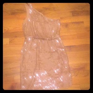 One shoulder fully sequined in champagne